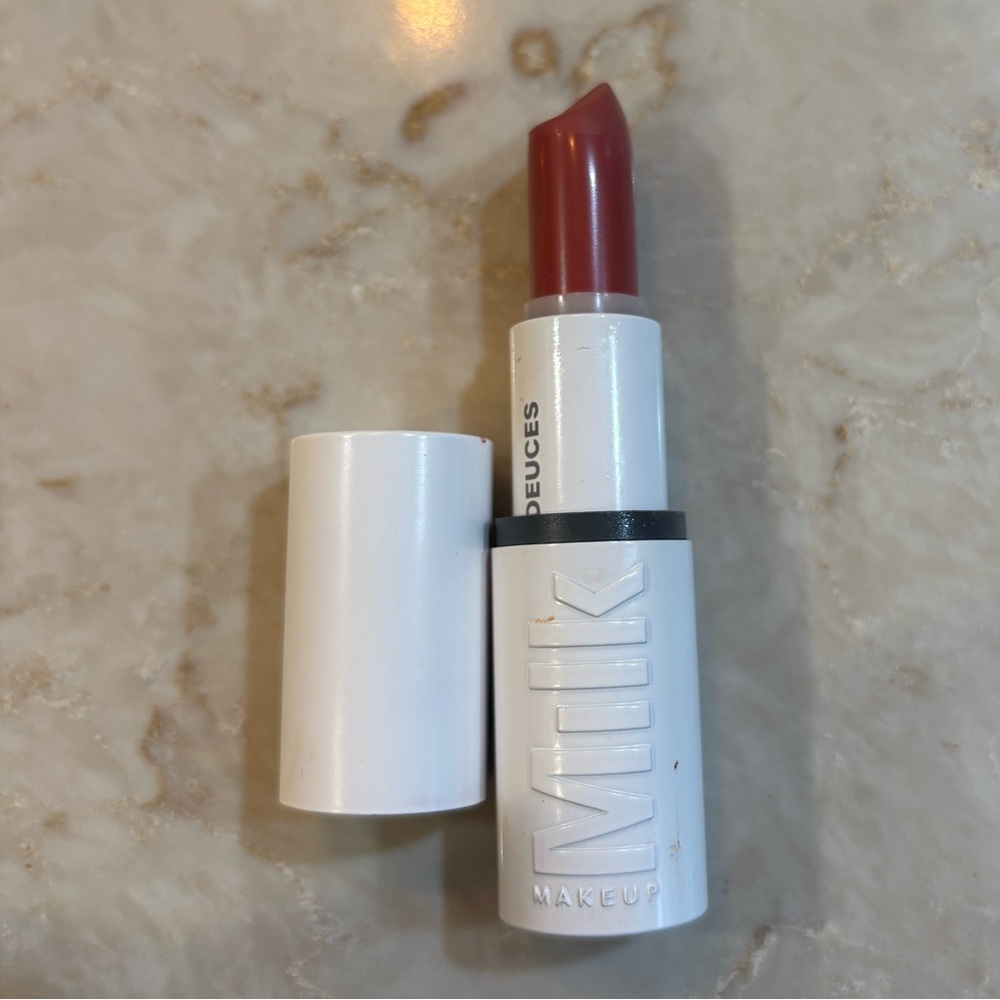 Milk Makeup lipstick in Deuces